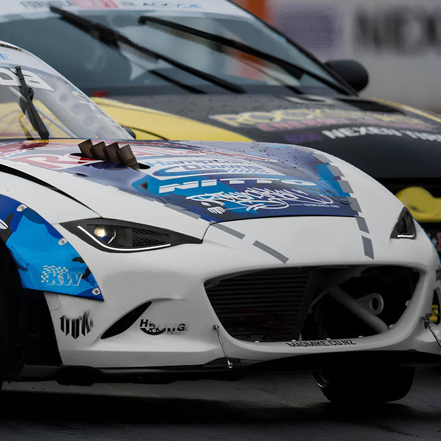 Mazda Miata MX-5 ND, ND5 Roadster lightweight battery, high-capacity lithium-ion battery, trunk-mounted battery relocation kit, optimized weight distribution, track-legal upgrade, race-spec power supply, improved charging system.

