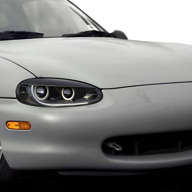 Mazda Miata MX-5 NB1 titanium exhaust, high-flow downpipe, turbo-back system, stainless steel headers, straight pipe, race muffler, lightweight performance, aggressive tone, dyno-proven power gains, JDM-spec sound upgrade.

