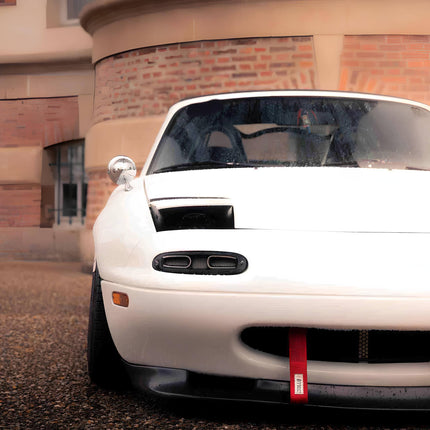 Convert your Mazda Miata NA to a hardtop for improved rigidity, better aerodynamics, and a sleek appearance. Hardtop options enhance performance and add a refined touch to your classic roadster.

