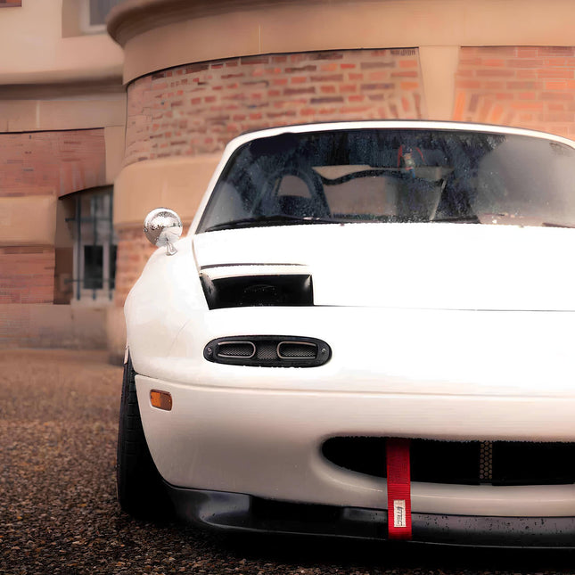 Convert your Mazda Miata NA to a hardtop for improved rigidity, better aerodynamics, and a sleek appearance. Hardtop options enhance performance and add a refined touch to your classic roadster.

