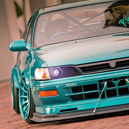 Toyota Corolla AE101 racing bucket seats, lightweight carbon fiber construction, FIA-approved bolstered support, track-ready seating upgrade.

