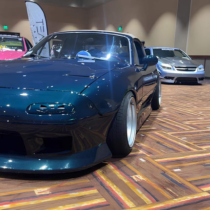 Miata MX-5 NA Roadster adjustable rear wing, carbon fiber GT spoiler, high-performance downforce optimization, track-spec rear stability, high-speed handling enhancement, aggressive styling, JDM aero tuning.

