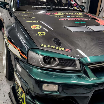 Skyline R34 GTS upgraded traction bars, reinforced high-strength steel construction, improved launch stability, enhanced power transfer, optimized track handling performance.

