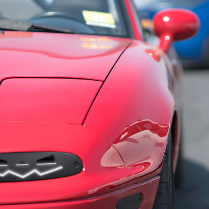 Mazda Miata MX-5 NA Roadster LED taillights, sequential turn signals, smoked or clear lens, modern lighting technology, high-performance rear-end styling, plug-and-play installation, enhanced road visibility.

