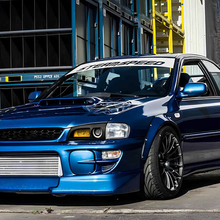 Subaru WRX GC8 upgraded turbo inlet pipe, high-flow silicone construction, improved airflow efficiency, reduced turbo lag, race-tuned forced induction upgrade.

