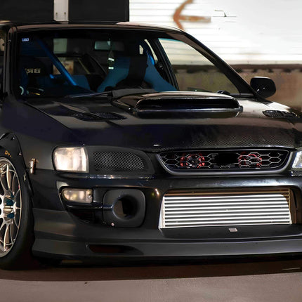 Subaru Impreza GC8 fully adjustable coilover suspension, race-spec damping control, improved ride height tuning, track-ready suspension stability, aggressive stance setup.

