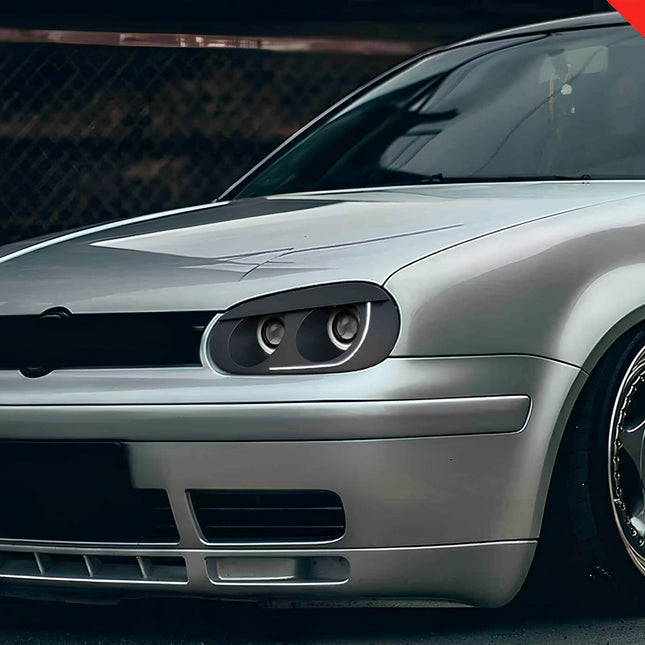 Golf Mk4 HID xenon headlights, aftermarket LED DRL upgrade, high-performance projector beams, smoked lenses, black housing headlamp assembly, sequential turn signals, enhanced road visibility, custom headlight retrofit, aggressive styling.

