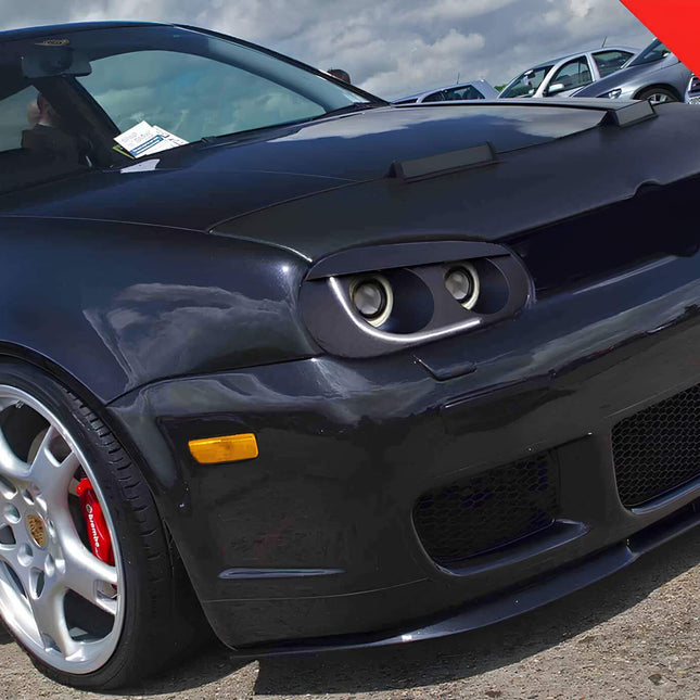 VW Golf 4 Mk4 headlight air duct, high-flow carbon fiber intake, race-spec turbo cooling system, forced induction airflow optimization, performance headlight vent, lightweight intake scoop, direct bolt-on system, increased engine efficiency.

