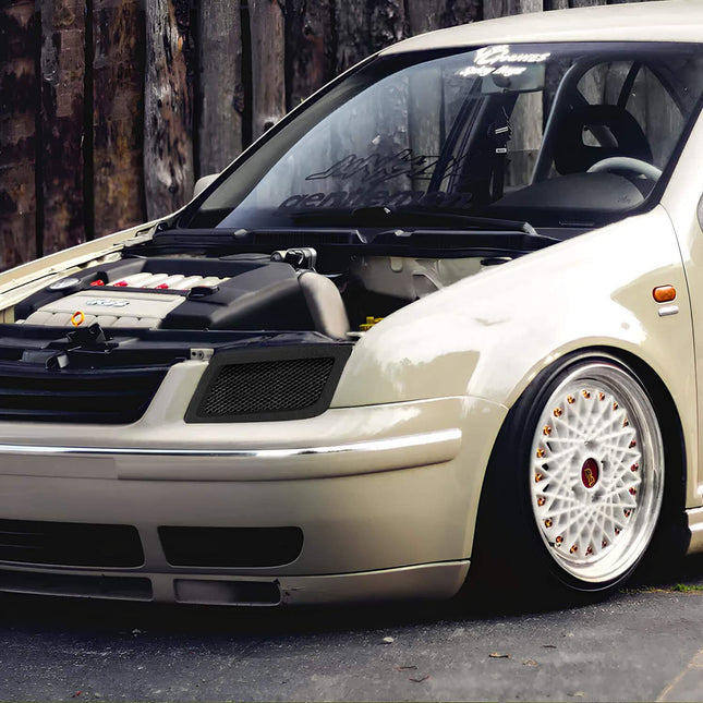 Volkswagen Jetta MK4 fully adjustable coilover suspension, race-spec damping control, improved ride height tuning, track-ready suspension stability, aggressive stance setup.

