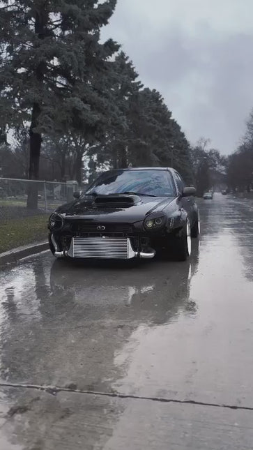 Subaru Outback performance exhaust system, stainless steel cat-back piping, high-flow catalytic converter, titanium muffler, aggressive race sound, optimized backpressure reduction.

