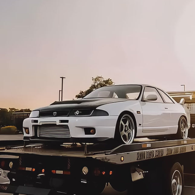Skyline R33 GTS25 adjustable carbon fiber GT wing, high-performance rear downforce optimization, track-ready aerodynamic improvement, lightweight styling, aggressive stance.


