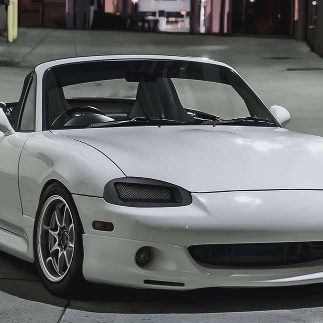 Miata MX-5 NB2 racing brake master cylinder, upgraded brake booster, stainless steel lines, high-performance braking system, race-spec pedal feel, track-ready stopping power, improved brake modulation.

