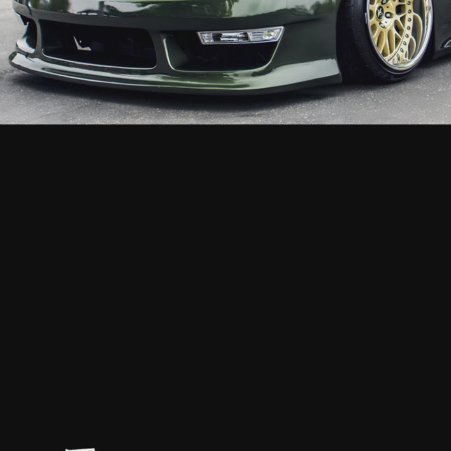 Nissan Silvia S14 big brake kit, lightweight multi-piston calipers, drilled and slotted rotors, high-friction ceramic pads, stainless steel brake lines, track-proven stopping power.

